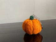 Felted pumkin key chain. Pumkin color with green stem and key chain