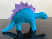 Felt dinosaur toy in blue