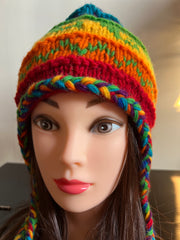Rainbow color knitted woolen sherpa hat with earflaps.  