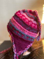 Multicolor knitted woolen sherpa hat with earflaps. 