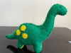 Felt dinosaur toy in green