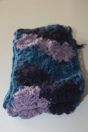 Soft hand knitted colorful scarf.